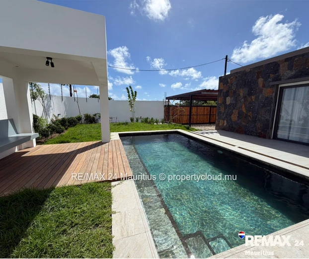 Brand new secured semi-furnished house, in a calm area yet within 12 minutes drive to Amenities.