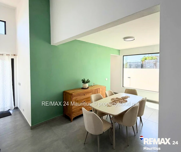 Brand new secured semi-furnished house, in a calm area yet within 12 minutes drive to Amenities.