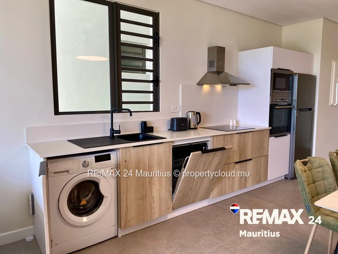 Luxury 2-Bed Apartment with Private Garden in Beachfront Residence