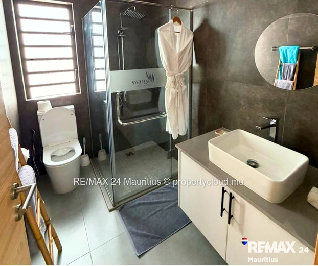 Brand new secured semi-furnished house, in a calm area yet within 12 minutes drive to Amenities.