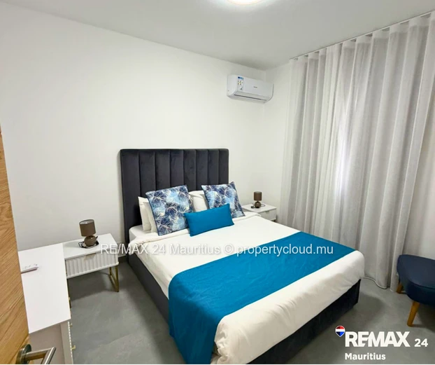 Brand new secured semi-furnished house, in a calm area yet within 12 minutes drive to Amenities.