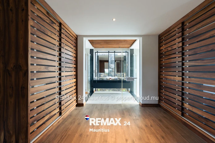 Elegant 4-bedroom Villa C with private pool, landscaped garden and spacious living areas.