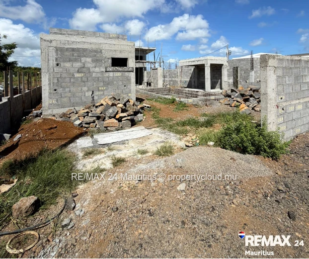 Brand new secured semi-furnished house, in a calm area yet within 12 minutes drive to Amenities.