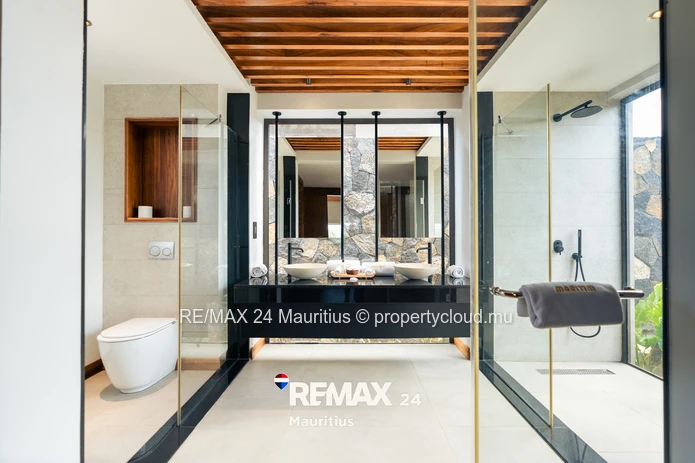 Elegant 4-bedroom Villa C with private pool, landscaped garden and spacious living areas.