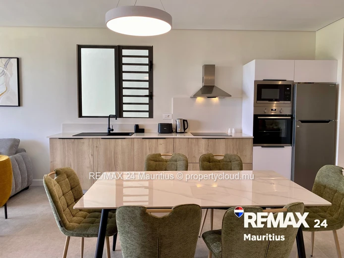 Luxury 2-Bed Apartment with Private Garden in Beachfront Residence