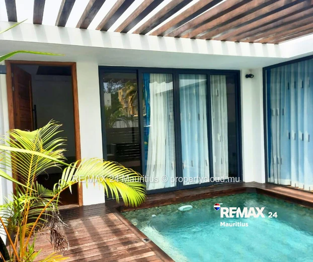 Walk to the Public Beach of Pereybere, Winners supermarket, ATM and bus stops
