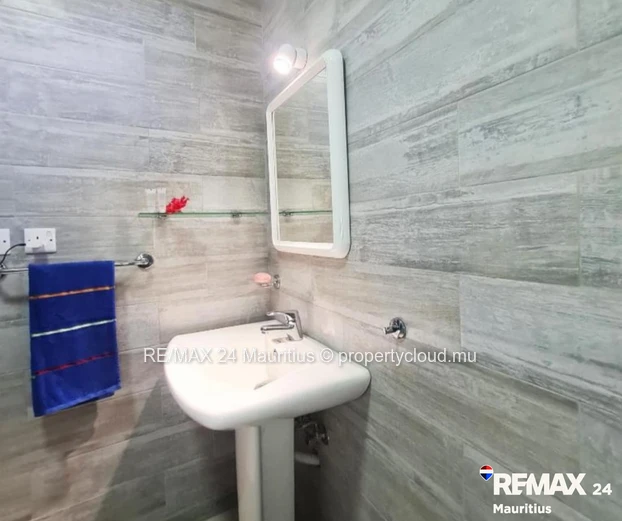 All ground floor apartment (simplex) within walking distance to the public beach