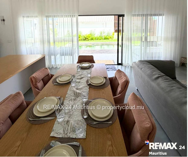 Brand new secured semi-furnished house, in a calm area yet within 12 minutes drive to Amenities.